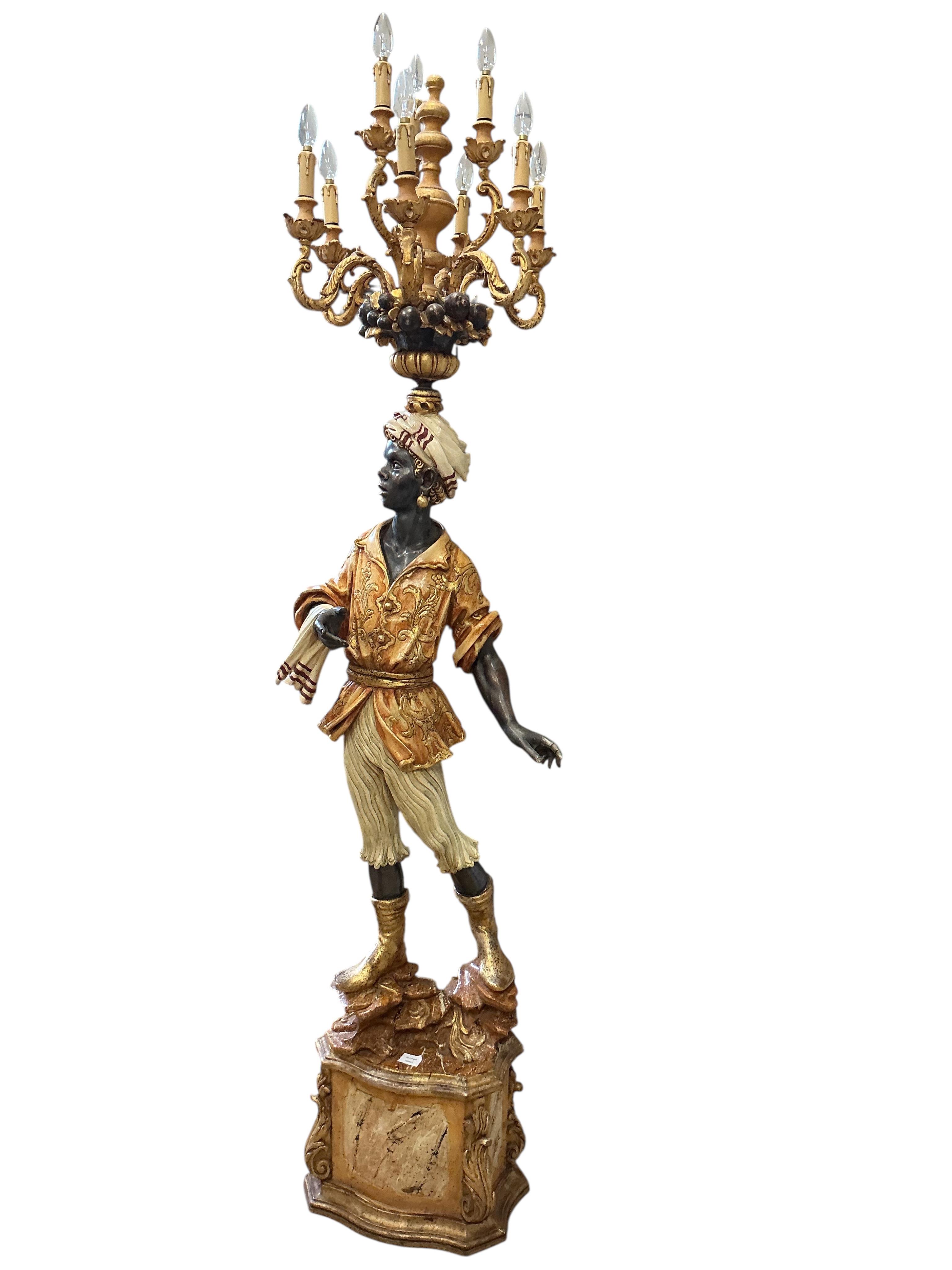 A pair of Venetian style Blackamoor floor lamps, height 218cm